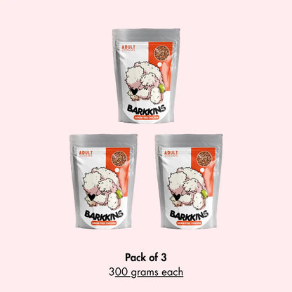 Three packages of Barkkins dog food on a white background