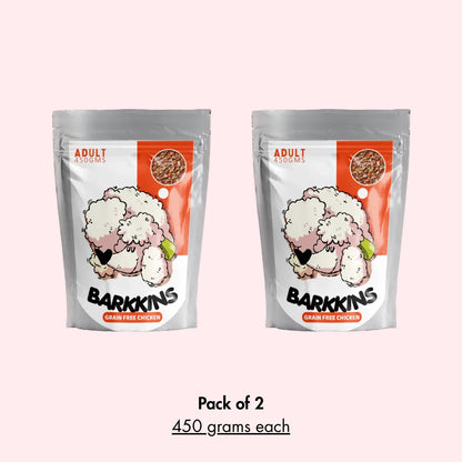 Two packages of Barkkins dog food on a white background