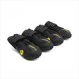 Set of black dog boots with yellow paw print logo on a white background
